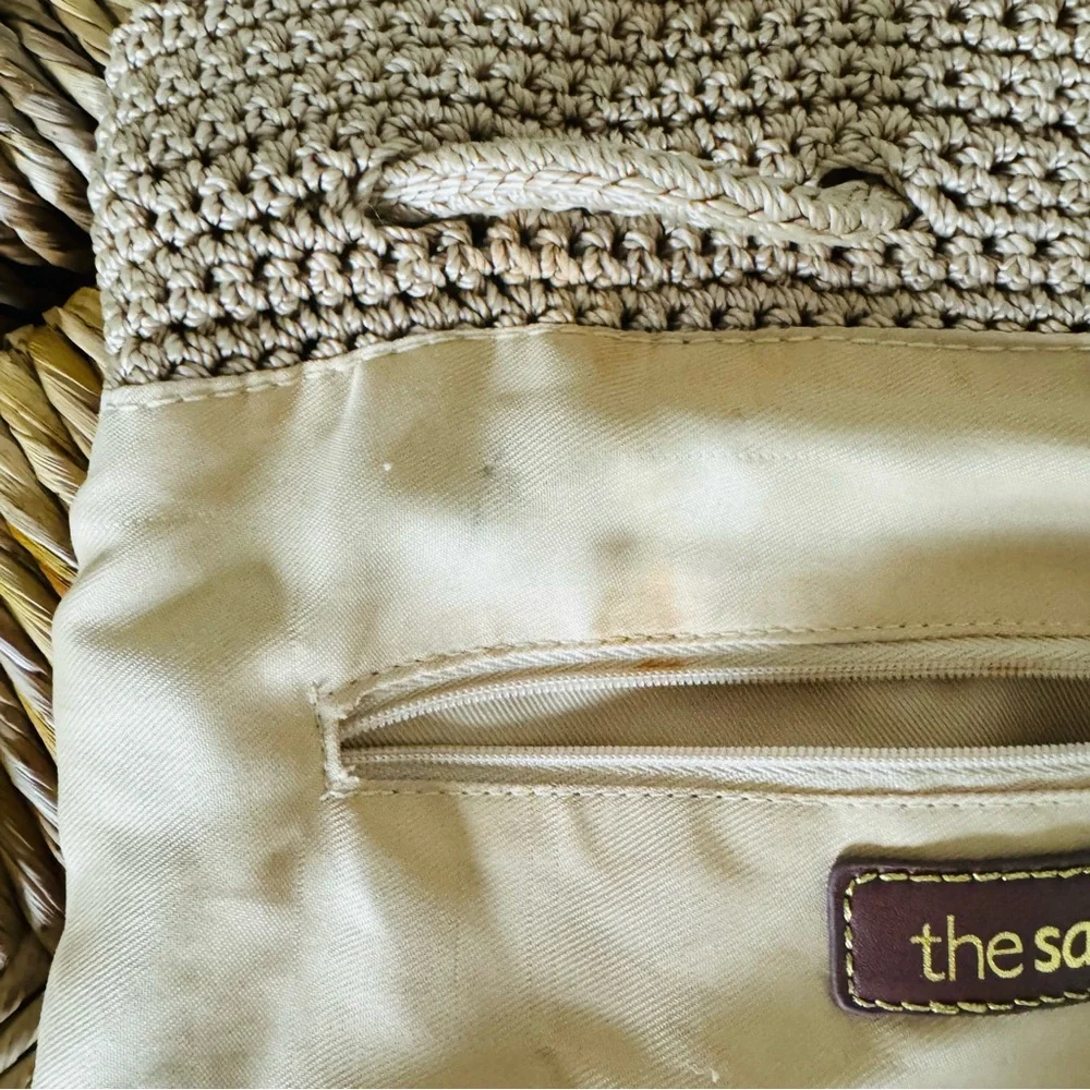 The Sak crochet drawstring backpack with zip pocket